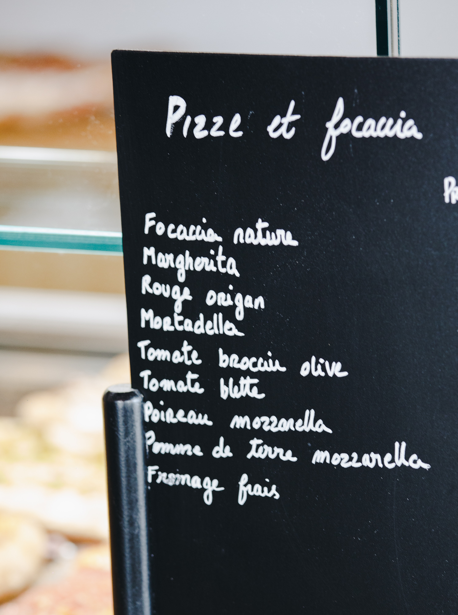 Spécialités salées Pizze et focacce à la coupe, fait à partir d'ingrédients de qualité. Fabrication dans notre Boulangerie Farina en Corse.